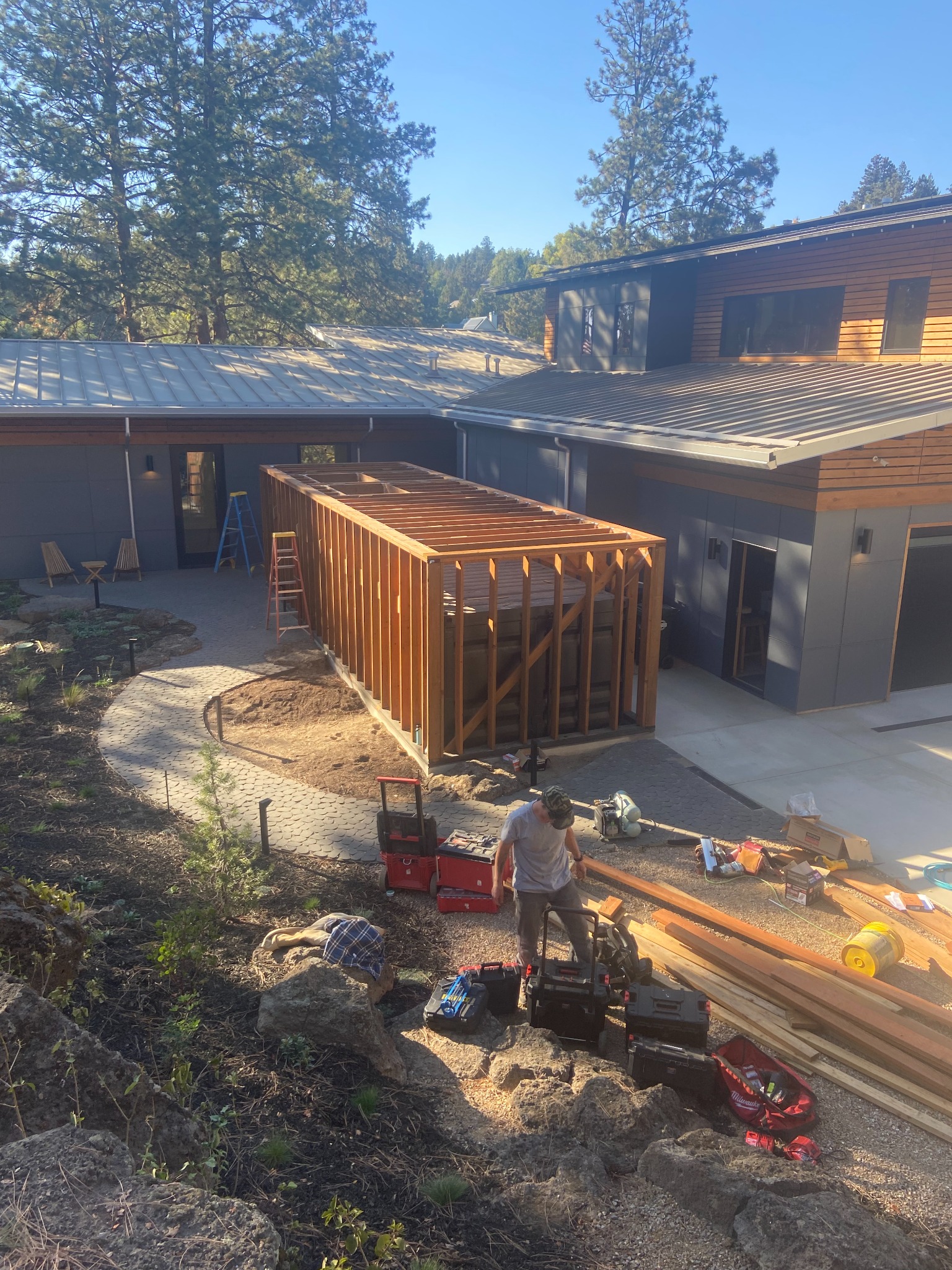 Cedar enclosure framing and construction phase by Skyliner Construction